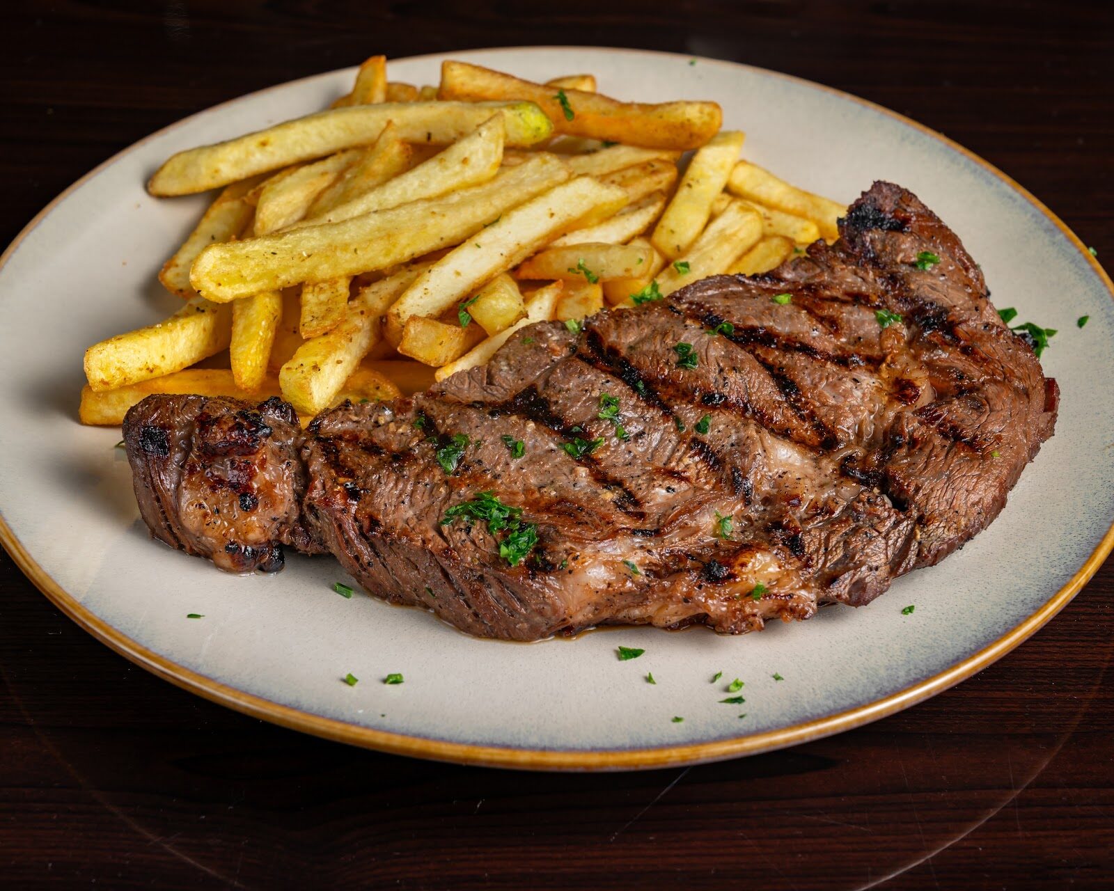 Ribeye steak with fries